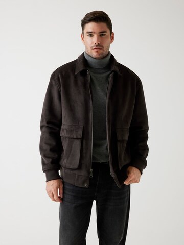 GUESS Between-Season Jacket in Brown: front