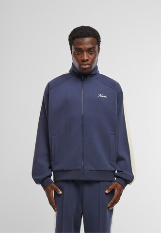 Veste de survêtement Karl Kani en bleu : devant