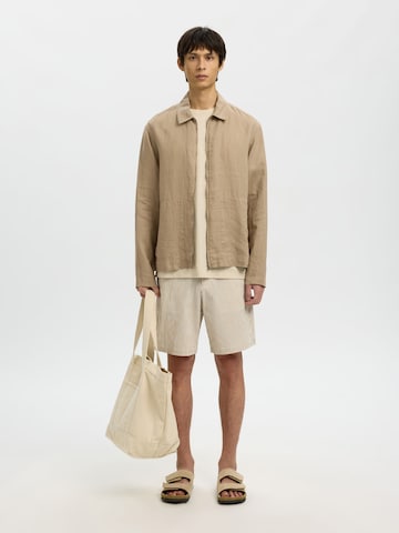 SELECTED Tussenjas in Bruin