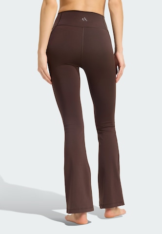 ADIDAS PERFORMANCE Flared Sports trousers 'All Me Essentials' in Brown