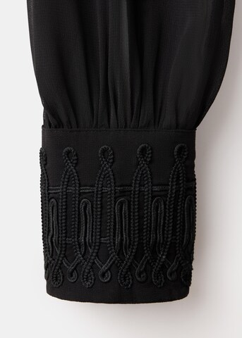 MANGO - Blusa 'CAYENNE' en negro