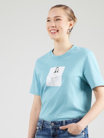 Calvin Klein Majica 'OBSESSION' | modra barva: sprednja stran