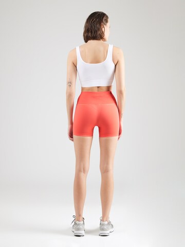 Skinny Pantaloni sportivi 'Define' di ICANIWILL in arancione