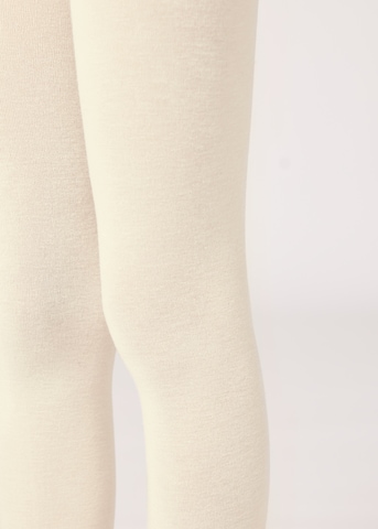 CALZEDONIA Tights in Beige