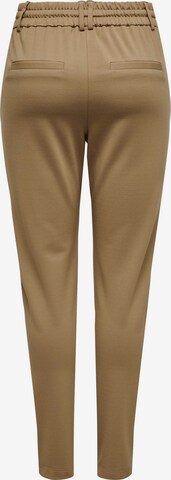 Slimfit Pantaloni con pieghe 'Poptrash' di ONLY in marrone