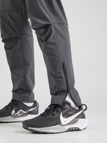 Nike Sportswear Tapered Trousers in Grey