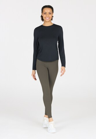 Athlecia Skinny Sportbroek 'Aliya' in Bruin