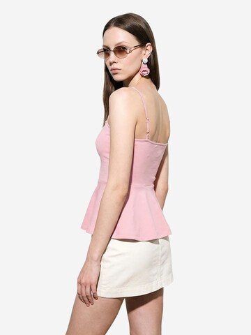 Haut Dilvin en rose