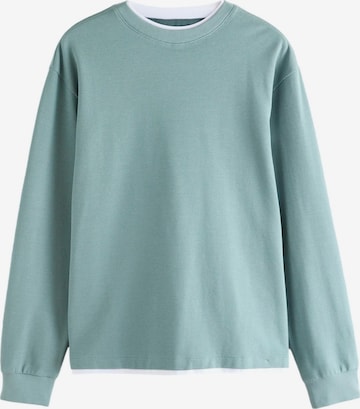 Tricou de la Next pe verde: față