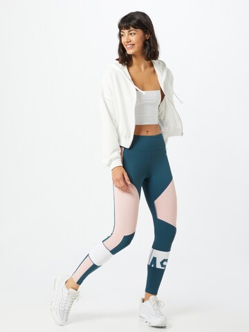 Skinny Pantalon de sport ASICS en bleu