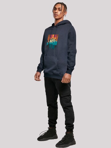 Sweat-shirt 'Berg Sonnenuntergang Retro' F4NT4STIC en bleu