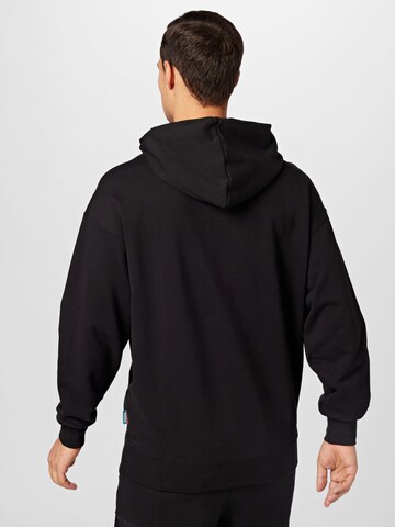 PUMA Sweatshirt 'Fandom' in Black
