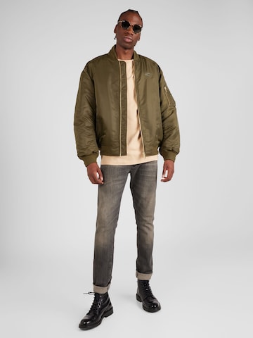 Tommy Jeans Prehodna jakna 'Authentic' | zelena barva