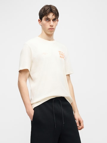 Loosefit Pantalon 'TECH FLC' Nike Sportswear en noir