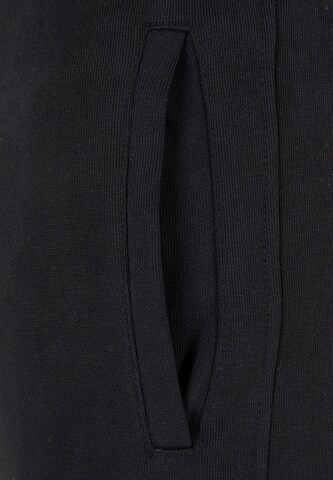 9N1M SENSE Slimfit Hose in Schwarz