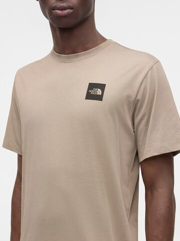 THE NORTH FACE Μπλουζάκι 'EVOLUTION' σε γκρι