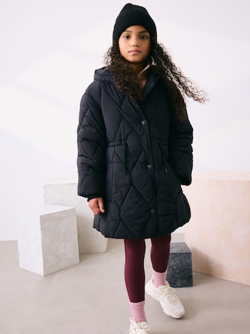 Next Mantel in Schwarz