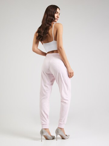 Juicy Couture Tapered Housut 'Pipa' värissä vaaleanpunainen