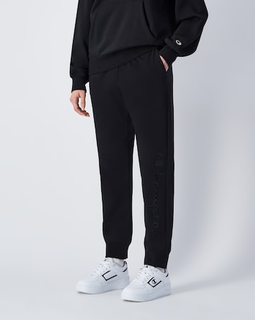 Champion Authentic Athletic Apparel Tapered Sports trousers in Black: front
