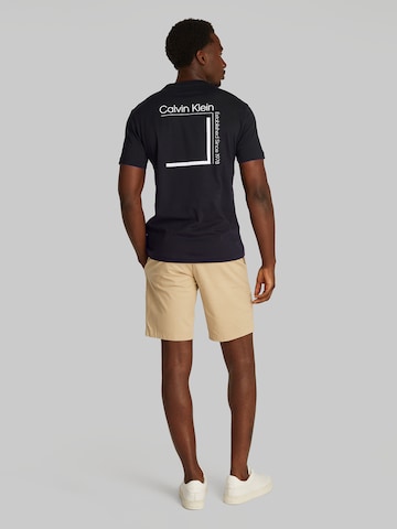 Calvin Klein Bluser & t-shirts i sort