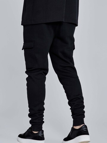 SikSilk Slimfit Sporthose 'Essentials Cargo Joggers' in Schwarz