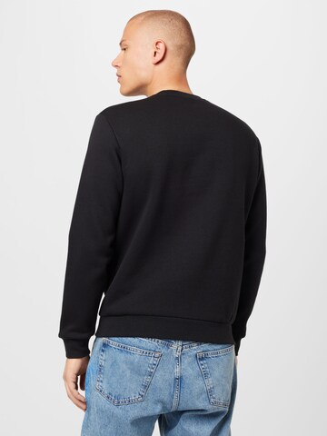 Champion Authentic Athletic Apparel Sweatshirt in Black