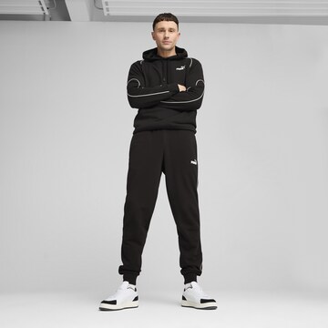 PUMA Tapered Sportbroek in Zwart