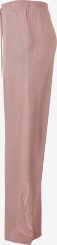 Karl Kani Lużny krój Spodnie 'KW221-022-1' w kolorze różowy