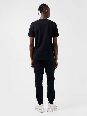 J.Lindeberg - Camiseta 'Sid' en negro