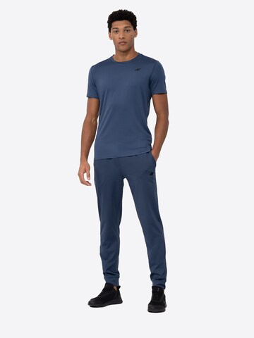 Effilé Pantalon de sport 4F en bleu