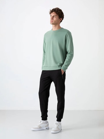 Tapered Pantaloni di Tommy Life in nero
