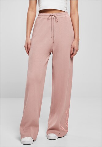 Karl Kani Loose fit Pants 'KW221-022-1' in Pink: front