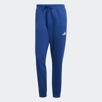 Tapered Pantaloni sportivi 'FEELCOZY' di ADIDAS SPORTSWEAR in blu: frontale