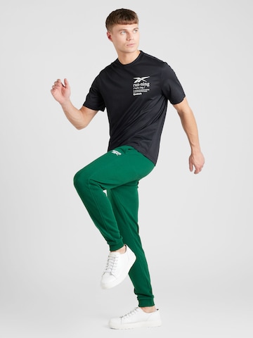 Reebok - Tapered Calças de desporto 'IDENTITY' em verde