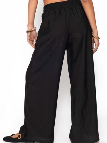 SASSYCLASSY Loose fit Trousers in Black