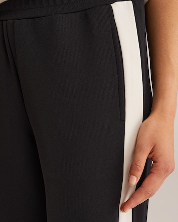 WE Fashion Regularen Hlače | črna barva