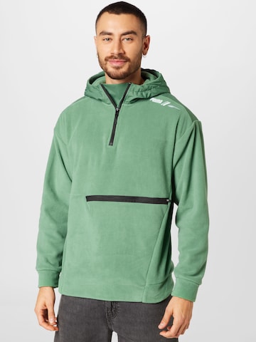 PUMA Athletic Sweater in Green: front