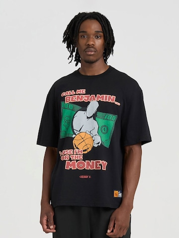 AND1 T-shirt 'Auf Dem Geld' i svart: framsida