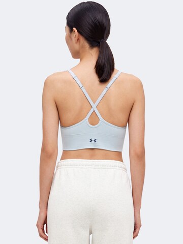 Bustino Reggiseno sportivo 'Vanish Seamless' di UNDER ARMOUR in blu