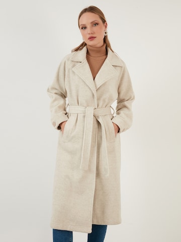 LELA Between-Seasons Coat in Beige: front