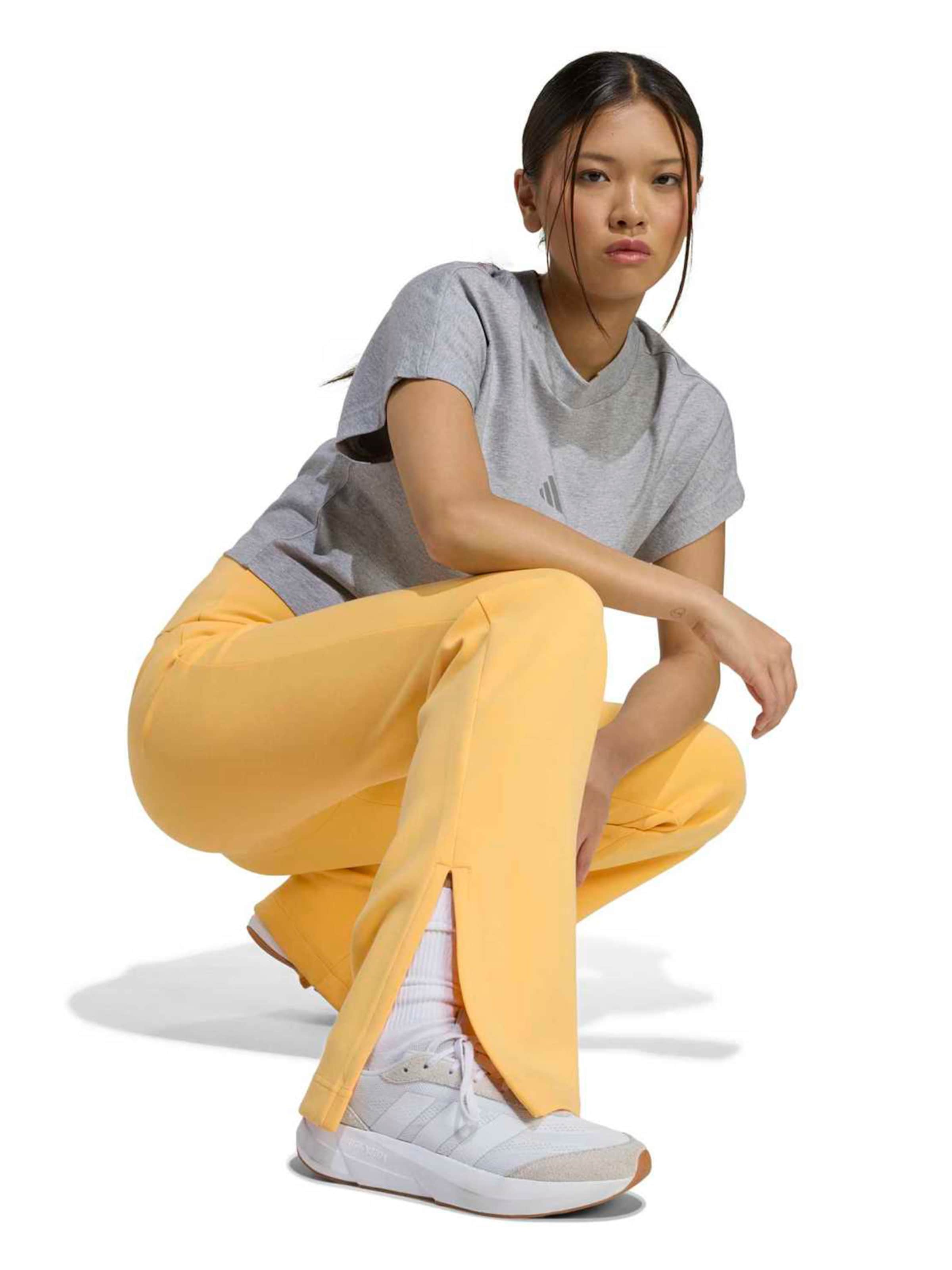 ADIDAS SPORTSWEAR Flared Sportnadrágok 'ALL SZN' - sárga