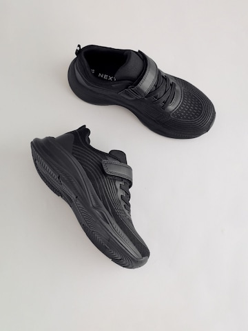 Baskets Next en noir