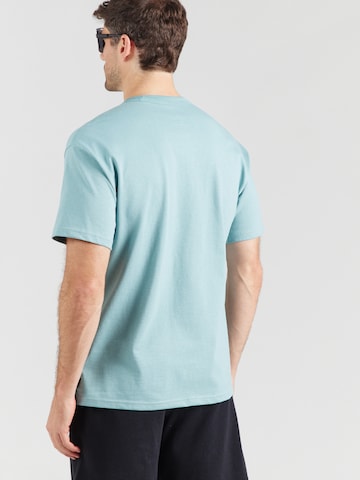 Nike Sportswear Tričko 'Premium Essentials' – zelená