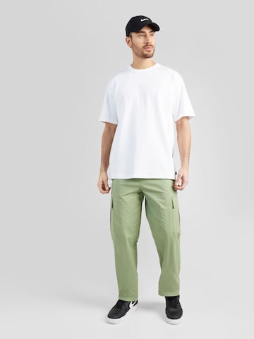 Nike Sportswear Regular Gargohousut 'CLUB' värissä vihreä