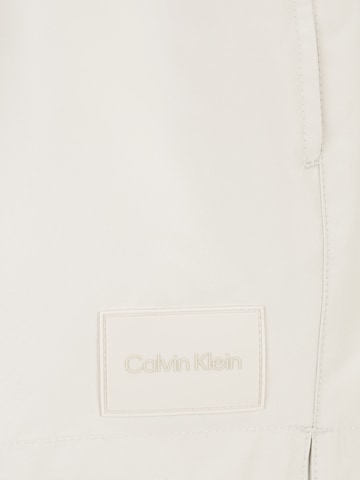 Calvin Klein Swimwear Ujumispüksid, värv beež