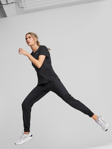 PUMA Tapered Sportbroek in Zwart