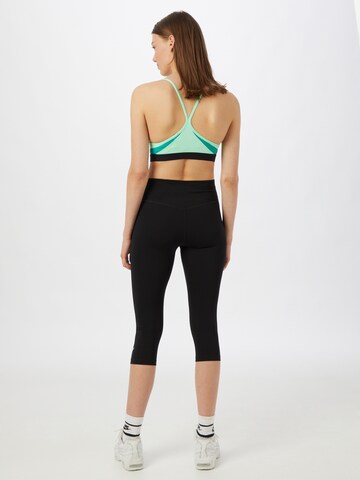 NIKE Skinny Sporthose in Schwarz