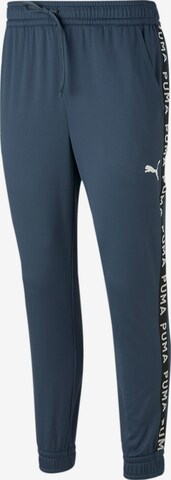 PUMA Tapered Workout Pants in Blue: front