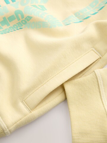 Sweat Next en jaune