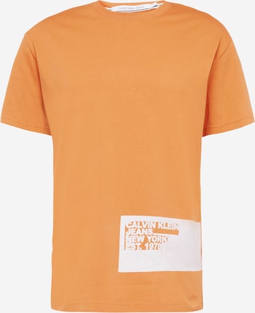 Tricou 'STENCIL' de la Calvin Klein Jeans pe portocaliu: față